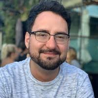 Adam Bee, speaks English, learning Spanish, from Colombia