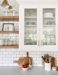 These wire shelves have legs that fold down so they can be placed on top of dishes. Kitchen Organization 101 A Thoughtful Place Kitchen