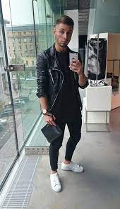Men S Black Leather Biker Jacket Black Crew Neck T Shirt Black Jeans White Leather Low Top Sneakers Mens Outfits Mens Street Style Mens Fashion