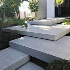 Fontanot floating stair with glass balustrade. Floating Concrete Magic Making An Entrance At Our Lush Gold Coast Project La Outdoor Pool Decor Floating Concrete Steps Floating Concrete Stairs