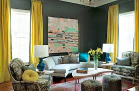 A cream accent chair adds light yellow to the space, while mustard and olive curtains add depth to the scheme. Beautiful Bedrooms Living Rooms Foyers Bathrooms With Yellow Accents Apartment Therapy