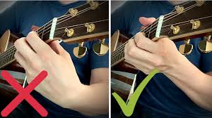 You don't have to sport a strap. 18 Top Tips For Beginner Guitarists Ryan Inglis Guitar Lessons