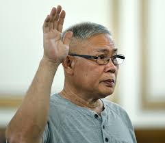 Arraignment delayed for Quincy man accused of setting raccoon