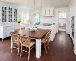 Measure the height of your table or counter. Kitchen Island Attached Table Ideas Photos