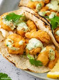 Fried shrimp and fish tacos. Fried Shrimp Tacos With Cilantro Lime Sauce Belly Full