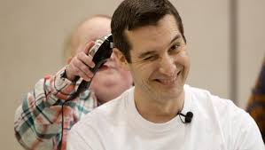 15 Photos: Western Hills principal shaves head in support of students