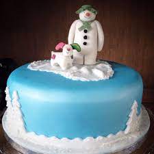 In this section you will find a fantastic range of cake decorations and cake and biscuit packaging featuring the main characters from the film. The Snowman And The Snowdog Christmas Cake Christmas Cake Designs Christmas Cake Christmas Cake Decorations