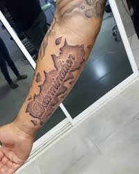 The weeping angel on the upper arm is a sweet tattoo that showcases a person's inner feelings of sadness. 33 Arm Tattoo Name Designs Cool