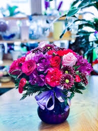 Set within a cylindrical clear glass vase, these artificial. Purple Plum Floral Arrangement In Lauderhill Fl A Royal Bloom Flowers Gifts