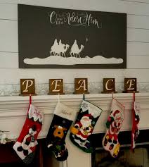 Next step in the diy mini stocking gift card holder is to draw the upper part of the boot on the white felt material and cut it out. Home Stockings Holders Christmas Stocking Hanger And The Stockings Were Hung Wood Sign Rustic Christmas Stocking Holder Stylish Farmhouse Holiday Decorations