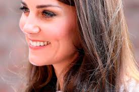 Kate Middleton goes casual in skinny jeans and trainers as she praises  'brilliant' Prince Harry