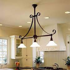 One can easily feel overwhelmed when look for kitchen wallpaper as there are plenty of option for your décor.there are a few thing one need to consider before you even begin. Country Kitchen Lamps Country Kitchen Lighting Country Light Fixtures Kitchen Lighting Fixtures Ceiling