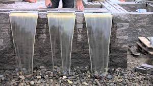 An easy to make waterfall diffuser fo. How To Integrate Waterfall Spillways From Aquascape In A Retaining Wall Youtube