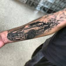 Black and grey car parts tattoo on left sleeve. 50 Best Free Car Tattoo Designs And Ideas Car Tattoos Chevy Tattoo Mechanic Tattoo