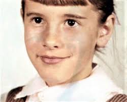 What is the name of Debbie Harry's first band?