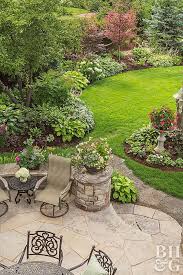 Patio And Chairs And Organic Landscape Shapes Garden Landscape Design Backyard Landscaping Designs Backyard