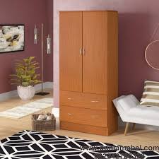 Terbuat dari kayu jati, desain lemari minimalis menggunakan panel flat mengambang didalam bingkai polos persegi. Lemari Pakaian Anak Minimalis Dunia Mebel