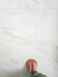 In fact, marble floors and tile can be finished in four distinct ways — with honed, polished, tumbled, or brushed finishes. Choosing Faux Carrara Marble Floor Tile For The Bathroom Marble Tile Bathroom Floor Carrara Marble Floor Marble Tile Floor