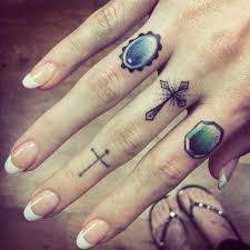 Nice and neat, simple yet beautiful, small but huge in meaning. Cross Tattoo On Finger Designs Ideas And Meaning Tattoos For You