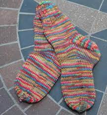 Here you'll find more than 120.000 free knitting patterns and crochet patterns with tutorial videos, as well as beautiful yarns at unbeatable prices! Try Your Hand At Knitting These Adorable Toddler Socks Kids Socks Knitting Knitting Socks Knitted Socks Free Pattern