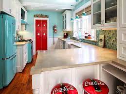 The cabinets in this kitchen offset the painted wall and the teal colored floor in such a way that everything pulls together in a classy contemporary look. 37 Colorful Kitchen Ideas To Brighten Your Cooking Space