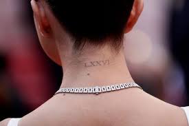 The side it translates to 'love yourself first'. Selena Gomez S Tattoos And Their Meanings