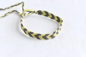 Do the same process for the opposite end of the string to make another adjustable knot. How To Make A Chevron Friendship Bracelet