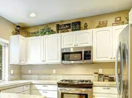 These modern baseboard heater covers have a no rust guarantee. 13 Modern Ideas For Decorating Above Kitchen Cabinets Lovetoknow