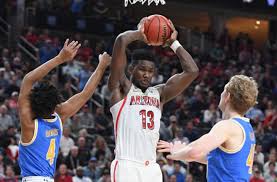 The family of star arizona wildcats freshman deandre ayton says it is outraged and disgusted by an espn report implying ayton received $100,000 in exchange to committing to ua. Ucla Basketball Vs Arizona Deandre Ayton Beats Bruins In Ot