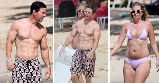 The couple were cute and casual as they shared the clip from home. Mark Wahlberg Flaunts Six Pack In Barbados As He Makes Out With Bikini Clad Wife Elite Readers