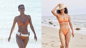 Fans also agree that the fault lies entirely with the script and not with actress halle berry, who tried to do her. Halle Berry Looks Exactly Like She Did As A Bond Girl In Die Another Day In An Orange Bikini On The Beach British Vogue
