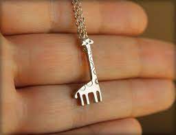 Tiny Giraffe Necklace In Silver Etsy Giraffe Necklace Necklace Silver Necklaces