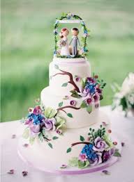 Check spelling or type a new query. Sugar Icing Decorated Wedding Cake In Blue Purple Chic Vintage Brides Chic Vintage Brides