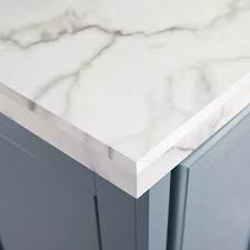 It can also create a sense of calm and comfort. Refined And Roomy Kitchen Makeover Kitchen Remodel Countertops Kitchen Countertops Laminate Formica Countertops