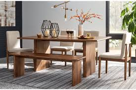 Modern furniture can be used as a focal point, or it can blend into a room. Isanti Dining Table Ashley Furniture Homestore