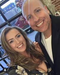 The moonlight glistening off my bald head onto my wife's plunging neckline.  This happens no less than 6-7 times a night.