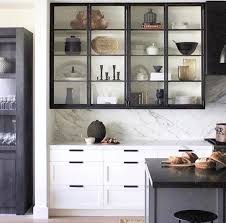 There Is Definitely A Modern Industrial Appeal To Steel Framed Glass Cabinetry In The Kitchen Kitchen Interior Glass Kitchen Cabinets Interior Design Kitchen