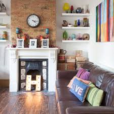 In this space, the wooden platform makes room for a sofa so there's somewhere to sit instead of the bed. Small Living Room Ideas How To Decorate A Cosy And Compact Sitting Room Snug Or Lounge