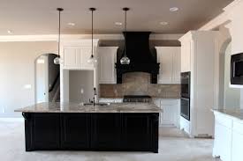 It's also a fantastic option for a moody accent wall or even on cabinets. Couto Custom Home Painted Cabinet Finish Sherwin Williams Perfect Greige On The Walls Sherwin Williams Mars Sherwin Williams Perfect Greige Greige Kitchen Home