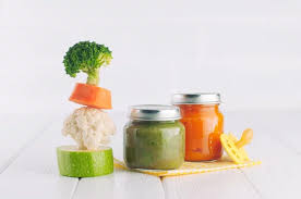 One uses the freshest seasonal ingredients and basic cooking techniques to simply enhance the natural flavor of the food. Baby Food Puree In Jars Near Pyramid Of Brocolli Carrot Cauliflower And Zucchini Pieces Stock Photo Adobe Stock