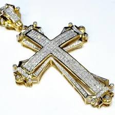 The karatage of the jewelry will tell you what percentage of gold it contains: Gold Cross Charm 2 5 Tall 1 75ct Real Diamonds 10k Yellow Gold Mens Big Pendant