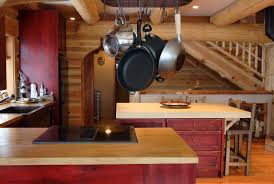 Matching your cabinets, with your flooring and furniture can create a cohesive country look. Log Cabin Kitchens Houzz