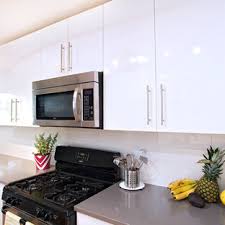 Abstrakt high gloss white kitchen to be matched with a neutral. High Gloss White Cabinets Houzz