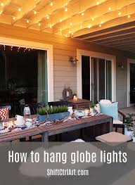 Maybe you would like to learn more about one of these? How To Hanging Globe Lights Over The Patio Dining Area Patio Backyard Patio Hanging Globe Lights