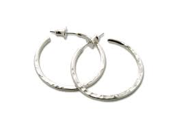 They're timeless and match with anything. Sterling Silver Hoop Earrings Jamie Santellano