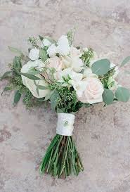 White peonies, roses, lamb's ears, and seeded eucalyptus combine for a bouquet that's worthy of the american horticulture society, which, coincidentally is where this wedding took place. Roses Ranunculus Hydrangea And Eucalyptus Wedding Bouquet Deer Pearl Flowers