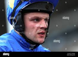 Jockey Harry Stock in the Martin Pipe Conditional Jockeys' Handicap Hurdle  during Gold Cup Day of the 2018 Cheltenham Festival at Cheltenham  Racecourse Stock Photo