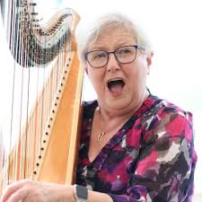 Emotional reunion for harpist Elinor Bennett and former choir member