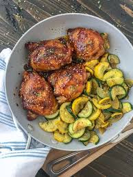 This One Pan Honey Garlic Chicken Thighs And Squash Recipe Is The Bee S Knees The Chicken T Easy Honey Garlic Chicken Honey Garlic Chicken Thighs Honey Garlic
