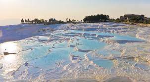 .have, over the millennia, built up deposits of white travertine on the plateau thus fully justifying both the site's ancient name of hierapolis (holy city) and its modern one of pamukkale (cotton castle). Pamukkale Wikipedia